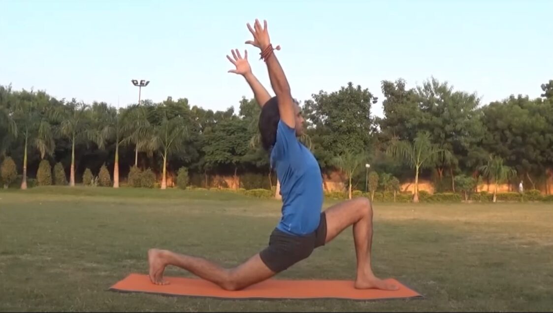 man doing Anjaneyasana exercise